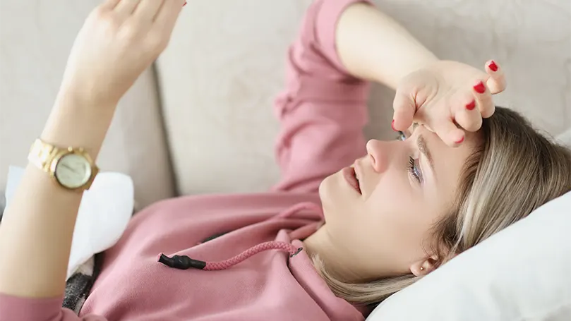 An image of a woman elevated head in bed.