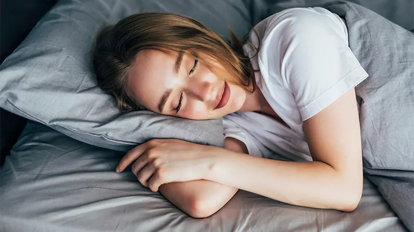 An image of a woman sleeping well