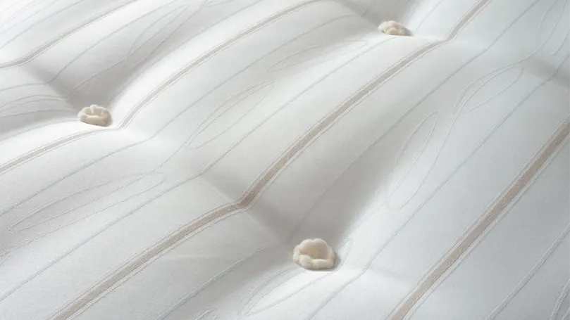 An image of tufted design of Sealy Millionaire Orthopaedic mattress.