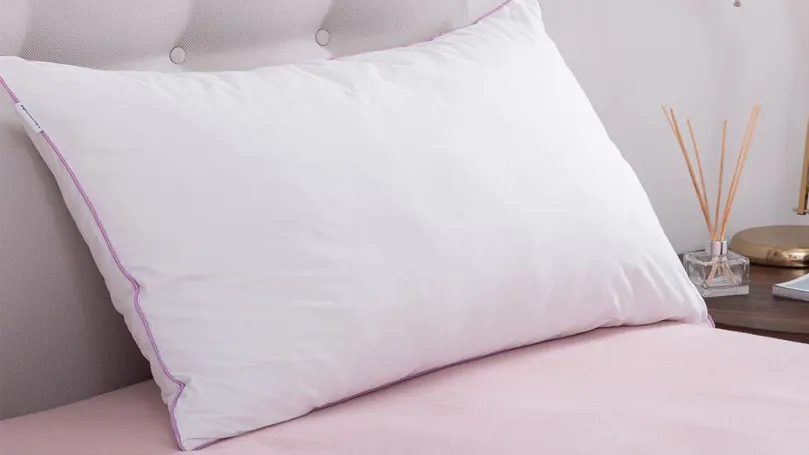 An image of the Silentnight Wellbeing Lavender Scented pillow on bed
