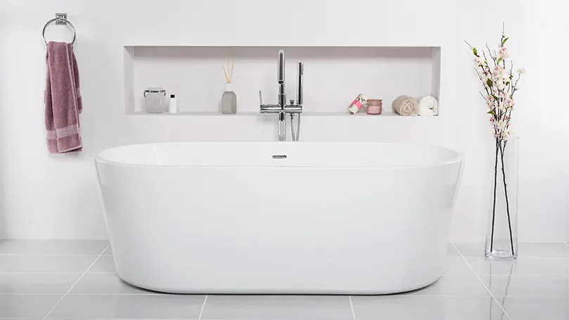 An image of a bath tub in a bathroom.