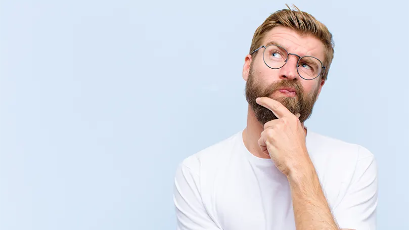 An image of a man wih glasses visualizing something.