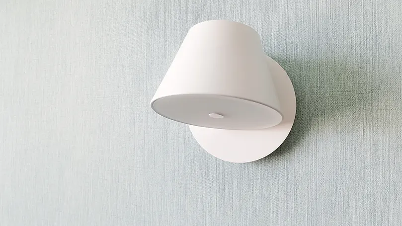 An image of a white sconce on a wall.