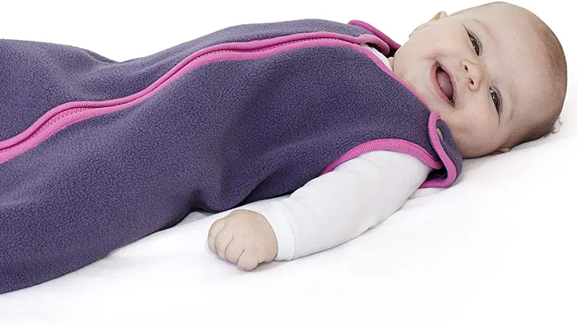 An image of a baby in a baby sleeping bag.