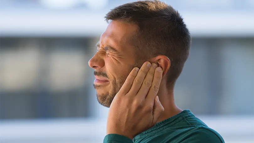 An image of a man with a ruptured eardrum.