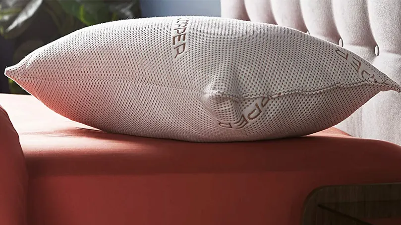 An image of Silentnight Wellbeing Copper Infused pillow on a bed.