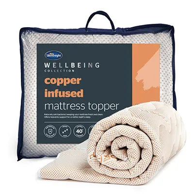 Product image of Silentnight Wellbeing Copper mattress topper in a package.