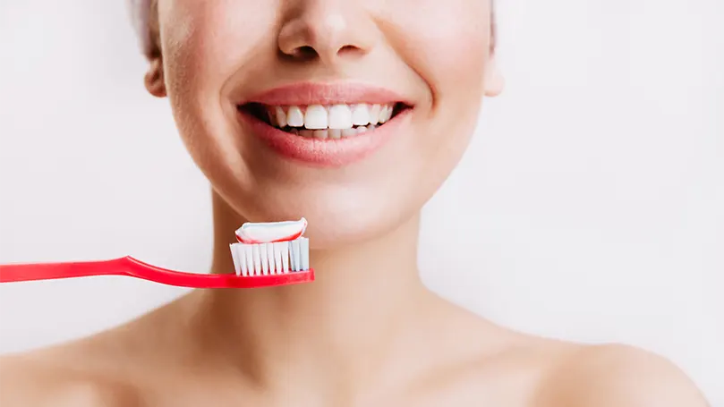 a-female-preparing-to-brush-teeth