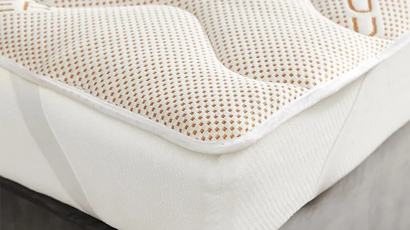 An image of Silentnight Wellbeing Copper mattress topper close up.