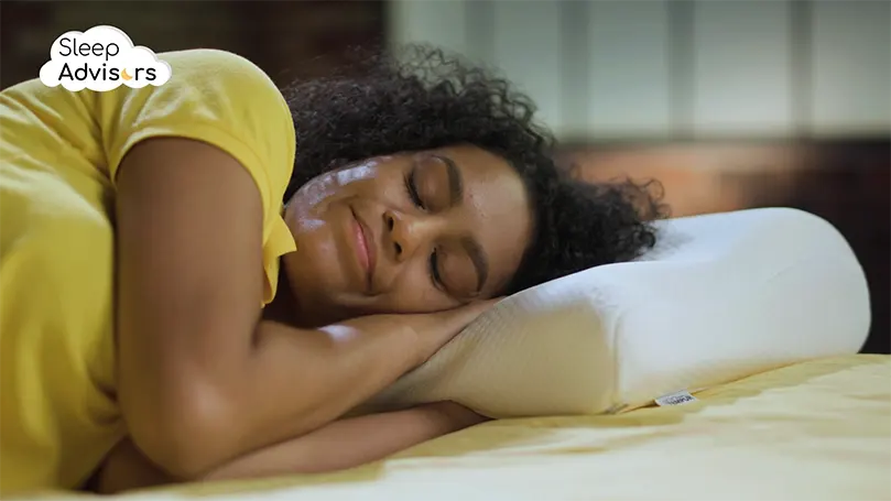 our reviewer sleeping on the Tempur pillow