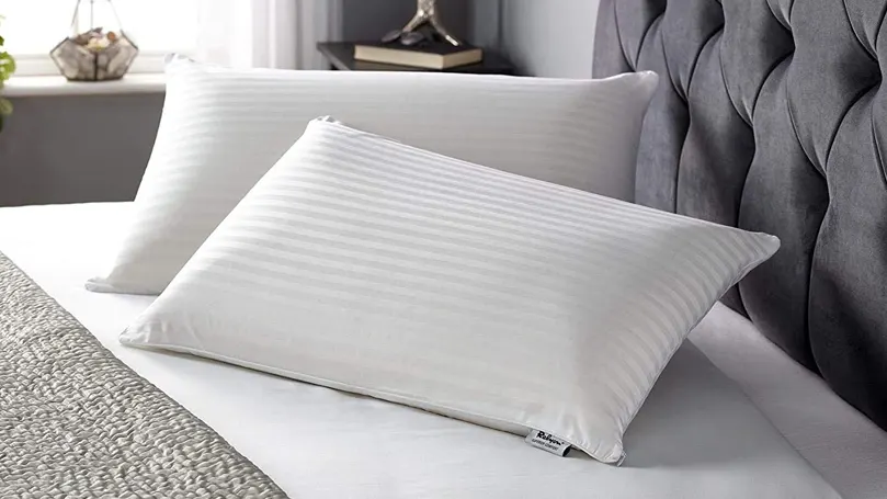 An image of two Relyon pillows on bed.