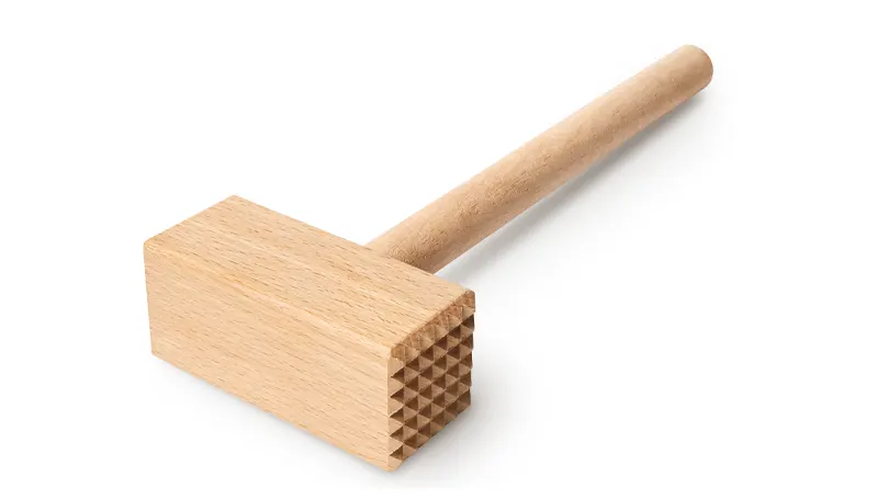 Obrázek dřevěného změkčovače masa.