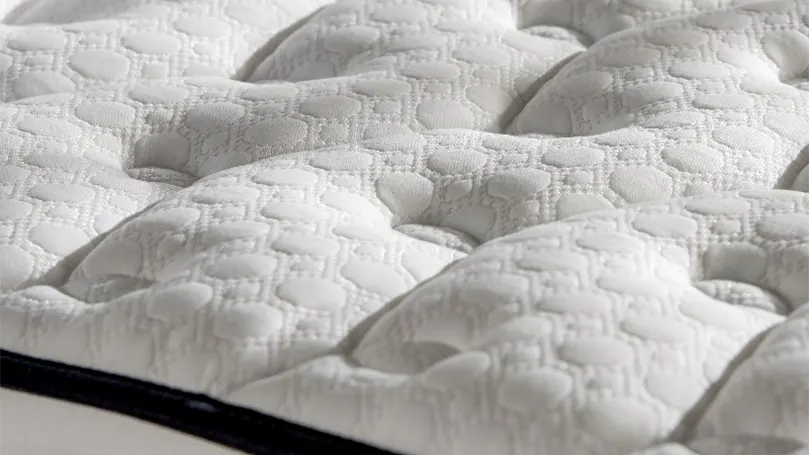 An image of King Arthur mattress top layer close up.