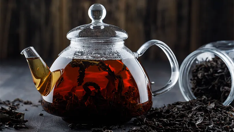 An image of a teapot filled with black tea