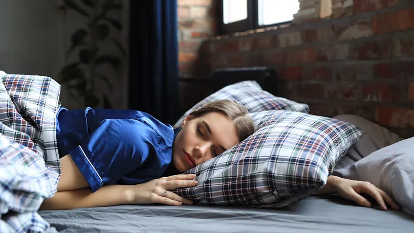 An image of a woman sleeping.