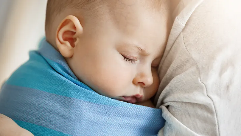 An image of a baby sleeping.