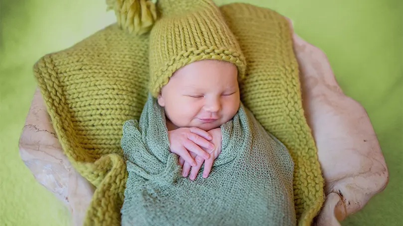 An image of a baby sleeping.