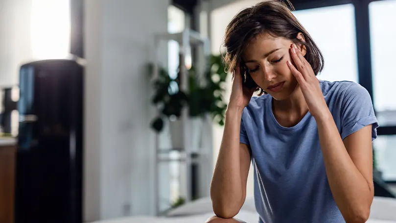 An image of a woman suffering from a panic attack