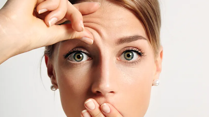 An image of a woman with wrinkles.