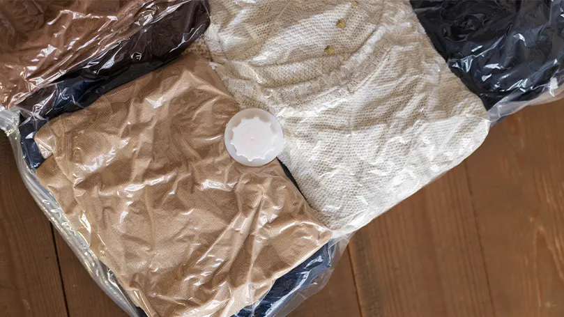 An image of clothes in a vacuum sealed bag