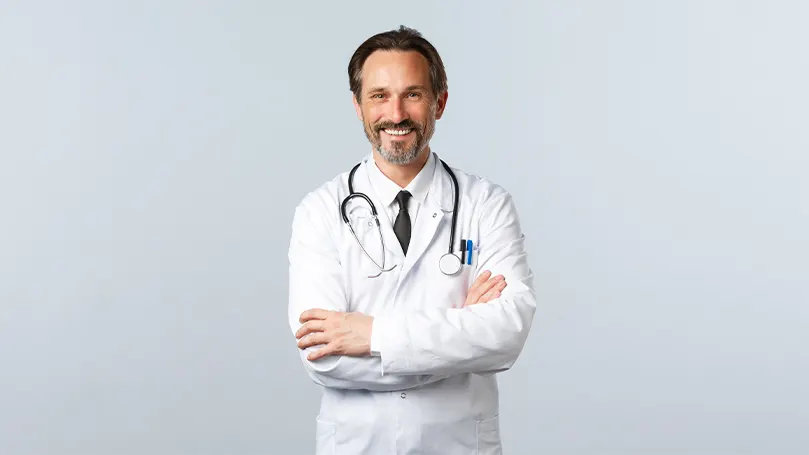An image of a doctor smiling.