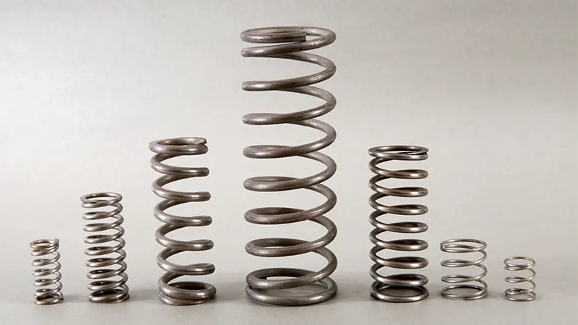 An image of multiple springs standing up