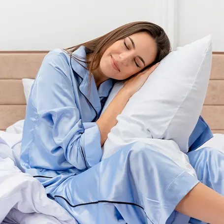 A woman leaning on pillow