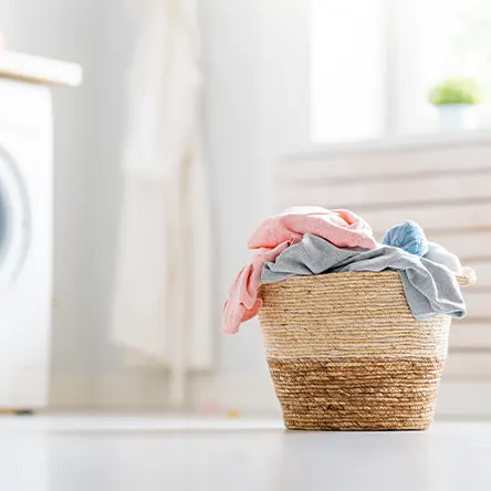 A laundry basket on the floor