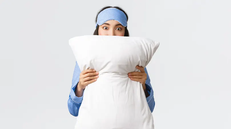 Pillows-infused-with-technology-woman-with-pillow