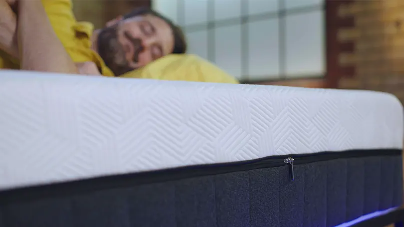 our reviewer sleeping on the panda hybrid bamboo mattress