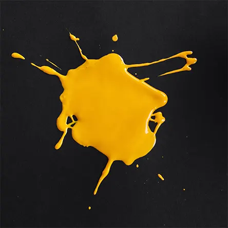 A yellow stain on black background