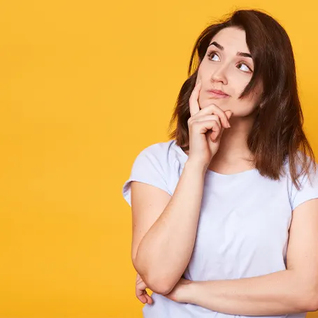 An image of a woman considering something