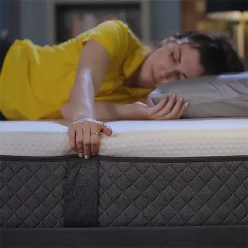 our reviewer Connie sleeping on Emma Nextgen Premium mattress