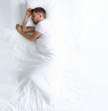 An image of a man sleeping.