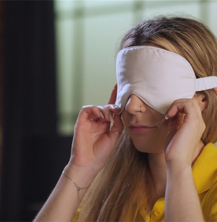 Reviewer wearing the Ethical Bedding eye mask.