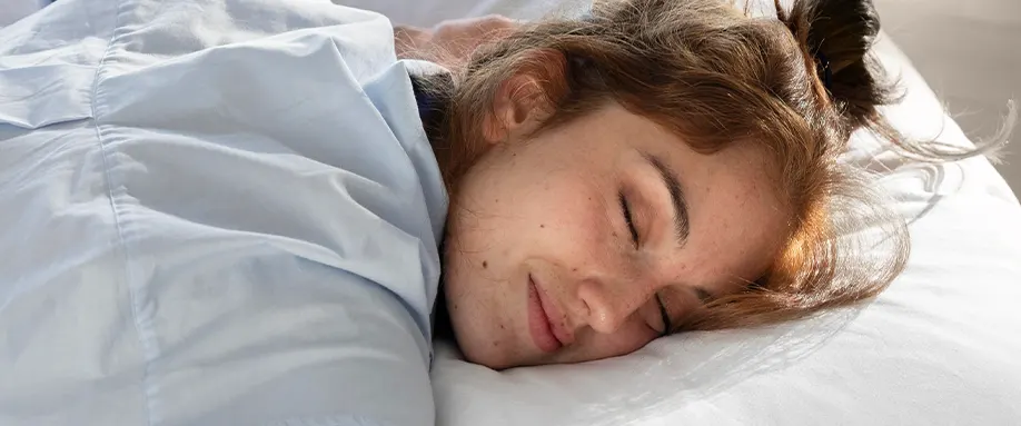 Woman sleeping on front